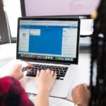 Education Technology - Woman Using Macbook Pro