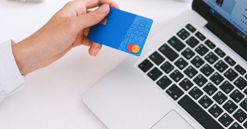 Ecommerce Shopping - Person Holding Bank Card