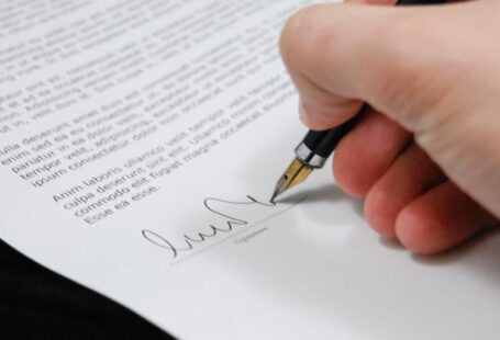 Legal Documents - Person Signing in Documentation Paper